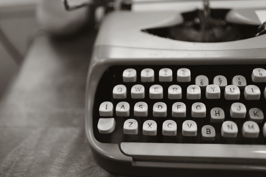 black and white image of a vintage typewriter